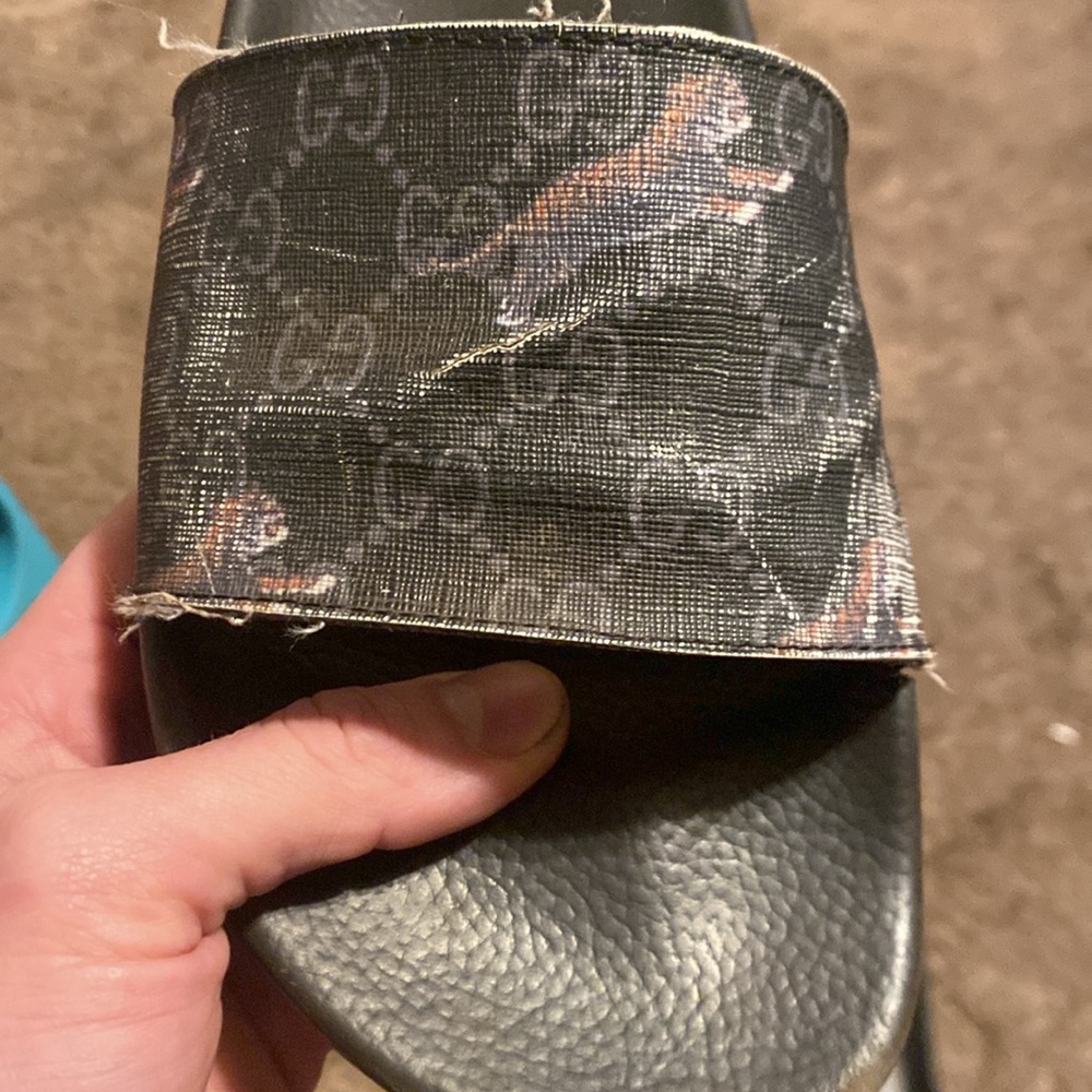 Gucci GG Supreme Tiger Slide Sandals.